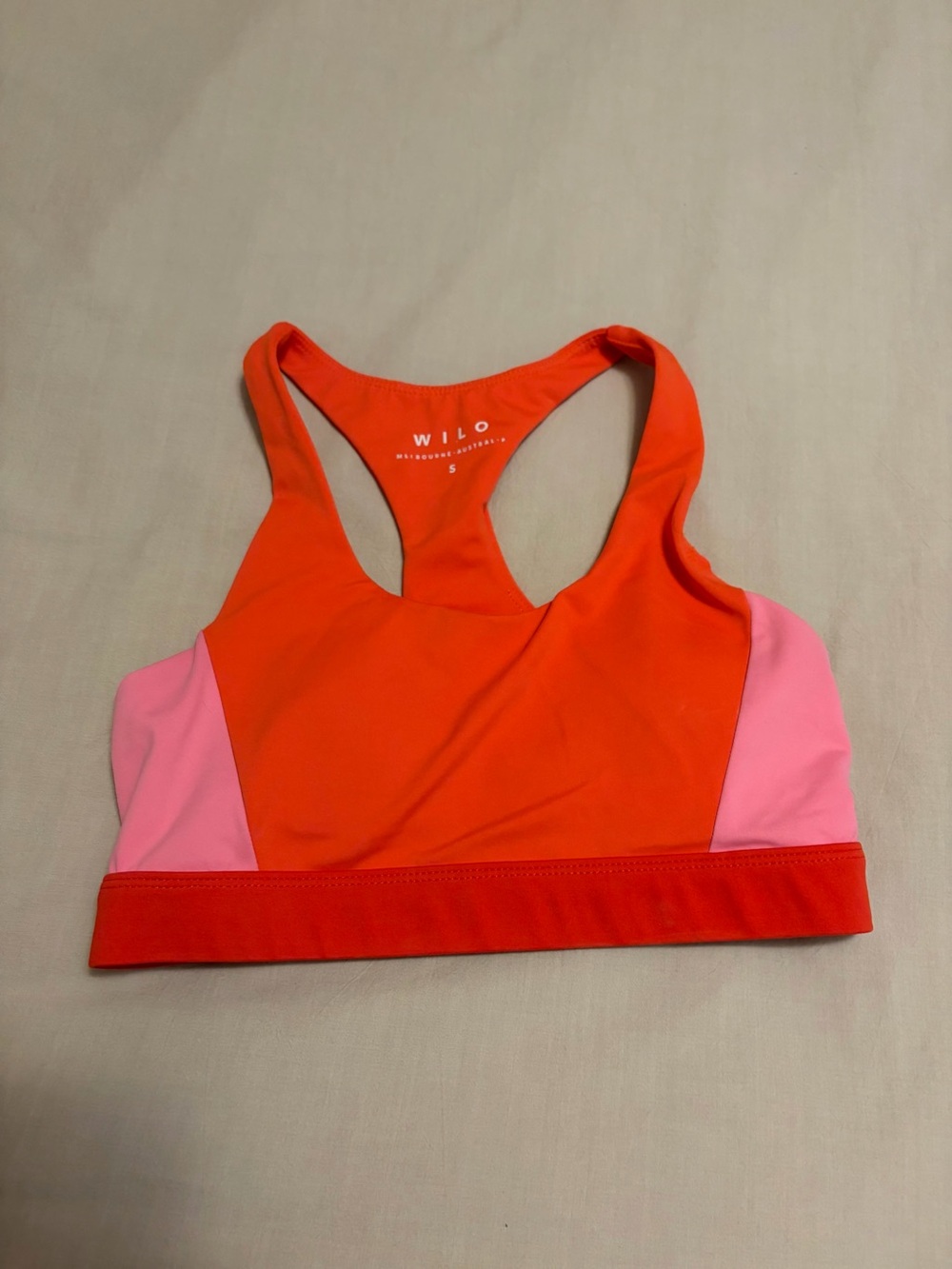 Wilo The Label color block pink and orange sports bra size small